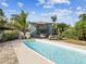 Outdoor pool surrounded by lush tropical landscaping in the backyard at 1225 26Th N St, St Petersburg, FL 33713