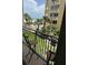 Enjoy ocean views from this balcony with chairs and a peaceful atmosphere at 1390 Gulf Blvd # 104, Clearwater, FL 33767