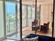Relaxing balcony with comfortable seating and views of the beach at 1390 Gulf Blvd # 104, Clearwater, FL 33767