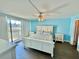 A beautifully appointed bedroom featuring a ceiling fan at 1390 Gulf Blvd # 104, Clearwater, FL 33767