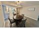 Charming dining area features a round table and is conveniently located near the kitchen at 1390 Gulf Blvd # 104, Clearwater, FL 33767