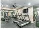 Well-equipped gym featuring treadmills, weights, and mirrored walls at 1390 Gulf Blvd # 104, Clearwater, FL 33767