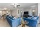 Comfortable living room with hardwood floors, ceiling fan, and modern decor at 1390 Gulf Blvd # 104, Clearwater, FL 33767