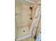 Tiled shower with adjustable shower head and built-in shelving at 1390 Gulf Blvd # 104, Clearwater, FL 33767