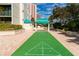 Shuffleboard and other outdoor activities on this community property with ocean access at 1390 Gulf Blvd # 104, Clearwater, FL 33767