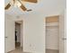 This bedroom features neutral colors, ceiling fan, and closet space at 1421 Normandy Park Dr # 6, Clearwater, FL 33756