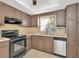 Functional kitchen with sleek appliances and ample counter space at 1421 Normandy Park Dr # 6, Clearwater, FL 33756
