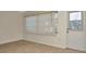 Bright living space with large windows and access to outdoor area at 1421 Normandy Park Dr # 6, Clearwater, FL 33756