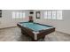 Interior view of the home's game room, showcasing a pool table at 147 Bluff View Dr # 206, Belleair Bluffs, FL 33770