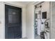 Utility access point with an entrance to a room containing electrical and HVAC equipment at 147 Bluff View Dr # 206, Belleair Bluffs, FL 33770