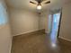 Cozy bedroom with ceiling fan, closet with mirrored doors, and bright natural light at 212 S Church Ave # 105, Tampa, FL 33609