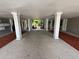 Parking garage with mailboxes and walkway to courtyard at 212 S Church Ave # 105, Tampa, FL 33609