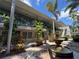 Charming courtyard with fountain, lush landscaping, and seating area on the first and second floor at 212 S Church Ave # 105, Tampa, FL 33609