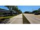 Street view showcasing a neighborhood street, sidewalk, and nearby buildings at 217 50Th N Ter, St Petersburg, FL 33703