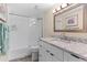 This bathroom is bright and inviting with a shower and tub combination and a single sink vanity at 2413 Bayshore Blvd # 605, Tampa, FL 33629
