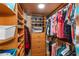 Walk-in closet providing generous storage with built-in shelving and drawers at 2413 Bayshore Blvd # 605, Tampa, FL 33629