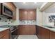 Updated kitchen featuring stainless steel appliances and modern finishes at 2413 Bayshore Blvd # 605, Tampa, FL 33629