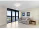 Bright living room featuring a sliding glass door to the balcony with amazing water views at 2413 Bayshore Blvd # 605, Tampa, FL 33629