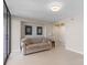 Bright living room featuring a sliding glass door to the balcony with amazing water views at 2413 Bayshore Blvd # 605, Tampa, FL 33629