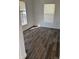 Bright bedroom featuring wood-look floors, natural light, and neutral walls at 2527 13Th S Ave, St Petersburg, FL 33701
