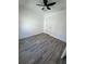 Bedroom boasts light grey flooring, a ceiling fan, and a crisp, clean aesthetic at 2527 13Th S Ave, St Petersburg, FL 33701