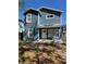 Charming two-story home with a covered front porch and freshly painted blue exterior at 2527 13Th S Ave, St Petersburg, FL 33701