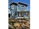 Charming two-story home with a covered front porch and freshly painted blue exterior at 2527 13Th S Ave, St Petersburg, FL 33701