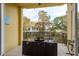 Outdoor balcony with dining area at 264 Seagate Ct, Dunedin, FL 34698