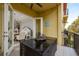 Outdoor balcony with dining area and adjacent to dining room at 264 Seagate Ct, Dunedin, FL 34698