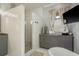 Modern bathroom featuring a walk-in shower, soaking tub, and vanity at 264 Seagate Ct, Dunedin, FL 34698