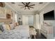 Inviting bedroom with a decorative wall and dark wood flooring at 264 Seagate Ct, Dunedin, FL 34698