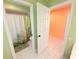 This bathroom offers a full shower and a separate adjacent dressing area at 4228 Presidential Avenue E Cir, Bradenton, FL 34203