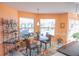 Bright breakfast nook featuring a casual dining table and a view of the outdoor pool area at 4228 Presidential Avenue E Cir, Bradenton, FL 34203