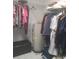Walk-in closet with wire shelving and a water heater at 4228 Presidential Avenue E Cir, Bradenton, FL 34203