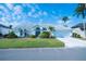 Charming single-story home with well-maintained landscaping and a white exterior, perfect for Florida living at 4228 Presidential Avenue E Cir, Bradenton, FL 34203