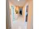 Bright hallway with tiled floors, fresh paint and convenient access to multiple rooms at 4228 Presidential Avenue E Cir, Bradenton, FL 34203