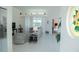 Bright living room features tile flooring, neutral decor, and ample natural light at 4228 Presidential Avenue E Cir, Bradenton, FL 34203