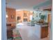 Inviting living area with fireplace, open layout, and views of the kitchen and adjacent spaces at 4228 Presidential Avenue E Cir, Bradenton, FL 34203