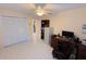Functional office space featuring white tile floors, built-in storage, and a comfortable workspace at 4228 Presidential Avenue E Cir, Bradenton, FL 34203