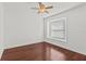 Cozy bedroom with hardwood floors and natural light at 426 Village Dr, Tarpon Springs, FL 34689