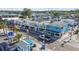 Aerial view of a charming commercial district with restaurants, shops, and street activity at 426 Village Dr, Tarpon Springs, FL 34689