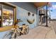Unique storefront features a bicycle adorned with sea sponges next to a window display at 426 Village Dr, Tarpon Springs, FL 34689