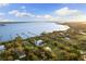 Breathtaking aerial showcases a waterfront community, complete with private docks at 450 Bayshore Dr, Terra Ceia, FL 34250