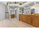 Spacious bathroom with wood cabinets, a large mirror, and a separate shower area at 450 Bayshore Dr, Terra Ceia, FL 34250