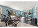 Large exercise room with state of the art gym equipment and natural light at 450 Bayshore Dr, Terra Ceia, FL 34250