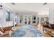 Spacious living room with hardwood floors, lots of light, and elegant furnishings at 450 Bayshore Dr, Terra Ceia, FL 34250