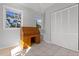 Office space with a roll top desk, ample lighting, and a nearby closet at 450 Bayshore Dr, Terra Ceia, FL 34250