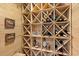 Custom wine cellar featuring ample wooden racking and storage, perfect for any wine enthusiast at 450 Bayshore Dr, Terra Ceia, FL 34250