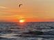 Sunset over the ocean with a kite surfer in the distance at 4900 Brittany S Dr # 1706, St Petersburg, FL 33715