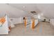 Spacious bonus room on upper level with carpet flooring and bright white paint is perfect for entertaining at 505 27Th N Ave, St Petersburg, FL 33704